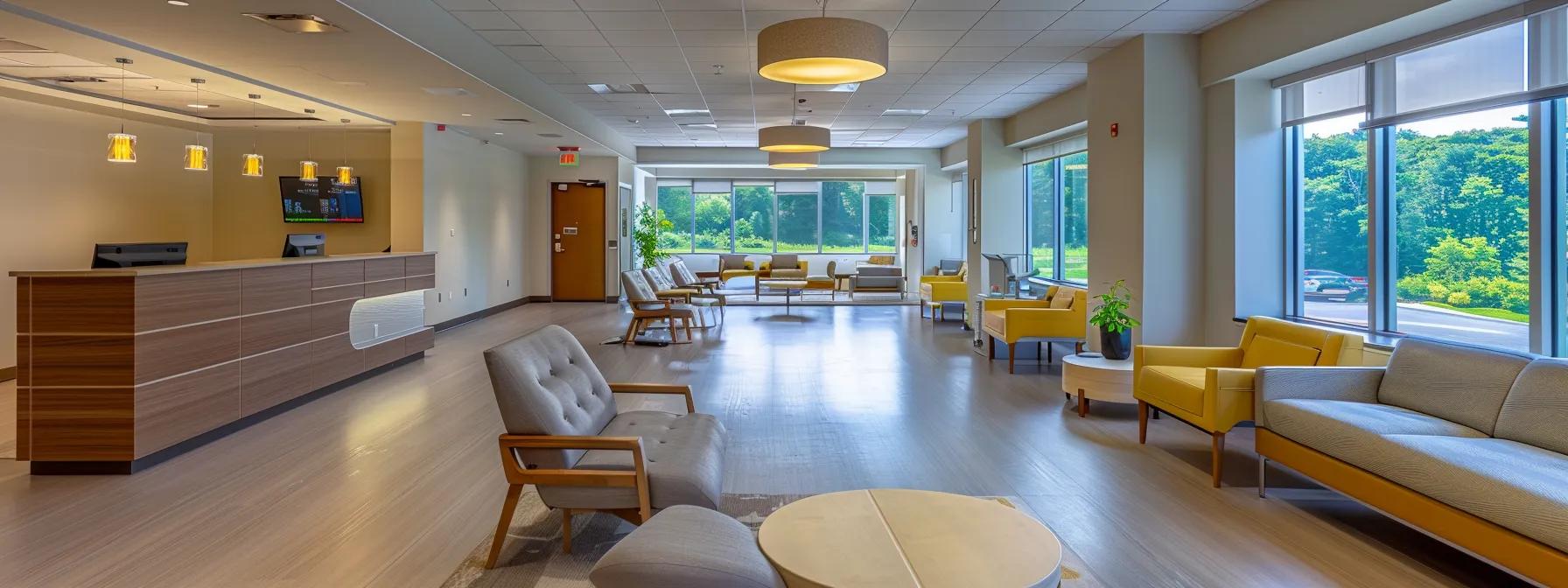 a bright and welcoming addiction treatment center in massachusetts, featuring modern interiors and open spaces, where individuals engage in thoughtful discussions about their recovery paths. a bright and welcoming addiction treatment center in massachusetts, featuring modern interiors and open spaces, where individuals engage in thoughtful discussions about their recovery paths.